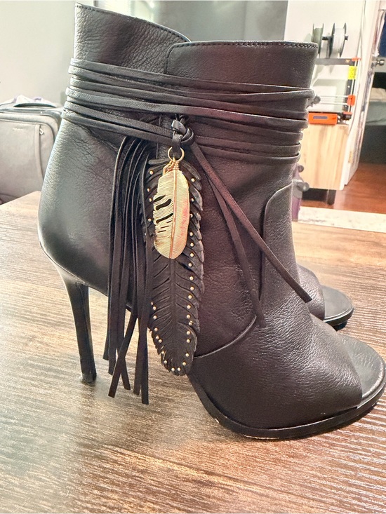 Coach Shoes - Coach Black Leather Fringe Ankle Heels with Gold Feather Charm